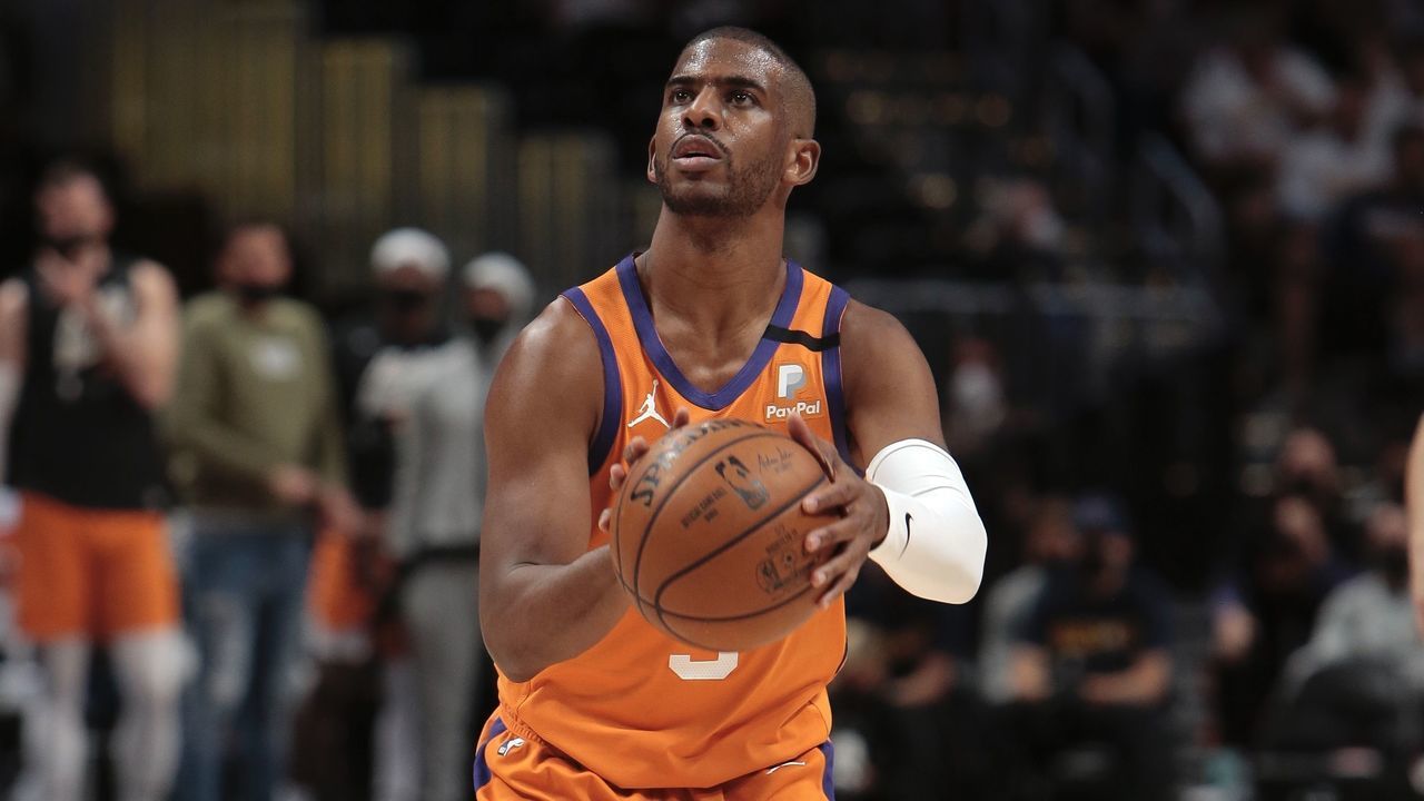 DENVER, CO - JUNE 11: Chris Paul #3 of the Phoenix Suns shoots a free throw against the Denver Nuggets during Round 2, Game 3 of the 2021 NBA Playoffs on June 11, 2021 at the Ball Arena in Denver, Colorado. NOTE TO USER: User expressly acknowledges and agrees that, by downloading and/or using this Photograph, user is consenting to the terms and conditions of the Getty Images License Agreement. Mandatory Copyright Notice: Copyright 2021 NBAE