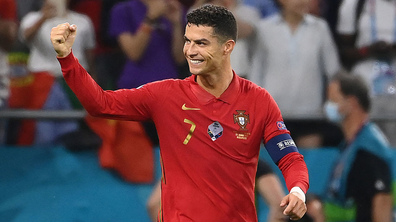 Portugal's forward Cristiano Ronaldo celebrates after scoring a penalty kick during the UEFA EURO 2020 Group F football match between Portugal and France at Puskas Arena in Budapest on June 23, 2021.