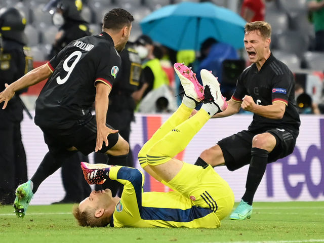 MUNICH, GERMANY - JUNE 23: Kevin Volland and Joshua Kimmich of Germany celebrate their side's second goal scored by team mate Leon Goretzka (not pictured) during the UEFA Euro 2020 Championship Group F match between Germany and Hungary at Allianz Arena on June 23, 2021 in Munich, Germany.