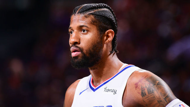PHOENIX, AZ - JUNE 22: Paul George #13 of the LA Clippers looks on during the game against the Phoenix Suns during Game 2 of the Western Conference Finals of the 2021 NBA Playoffs on June 22, 2021 at Phoenix Suns Arena in Phoenix, Arizona. Mandatory Copyright Notice: Copyright 2021 NBAE