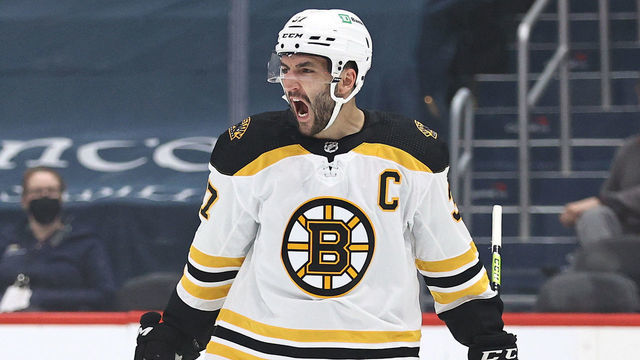 WASHINGTON, DC - MAY 17: Patrice Bergeron #37 of the Boston Bruins celebrates his goal in the first period against the Washington Capitals in Game Two of the First Round of the 2021 Stanley Cup Playoffs at Capital One Arena on May 17, 2021 in Washington, DC.