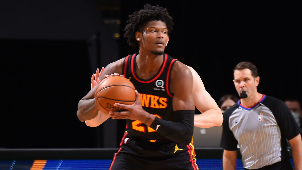 BOSTON, MA - FEBRUARY 17: Cam Reddish #22 of the Atlanta Hawks handles the ball during the game against the Boston Celtics on February 17, 2021 at the TD Garden in Boston, Massachusetts. Mandatory Copyright Notice: Copyright 2021 NBAE