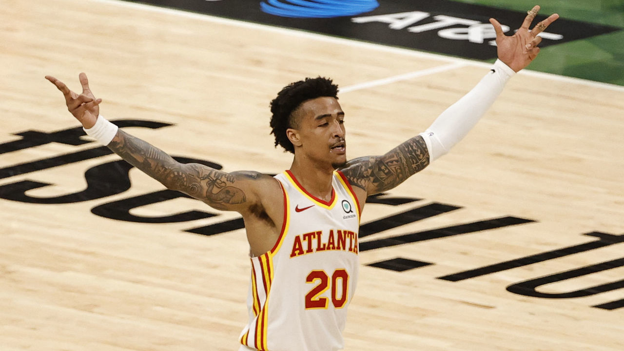 MILWAUKEE, WI - JUNE 23: John Collins #20 of the Atlanta Hawks celebrates during the game against the Milwaukee Bucks during Game 1 of the Eastern Conference Finals of the 2021 NBA Playoffs on June 23, 2021 at the Fiserv Forum Center in Milwaukee, Wisconsin. Mandatory Copyright Notice: Copyright 2021 NBAE .