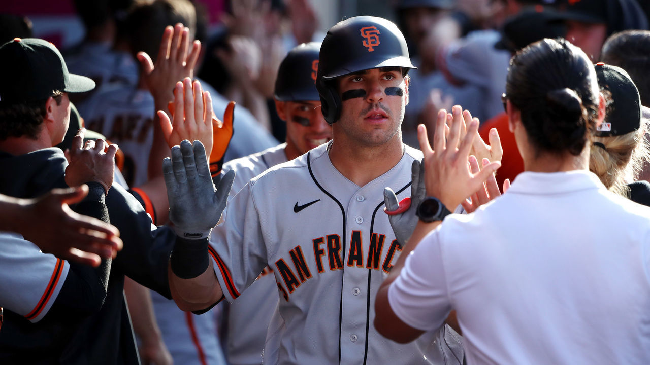 ANAHEIM, CALIFORNIA - JUNE 23: Mike Tauchman #29 of the San Francisco Giants celebrates his three-run home run in the dugout in the 13th inning against the Los Angeles Angels at Angel Stadium of Anaheim on June 23, 2021 in Anaheim, California.