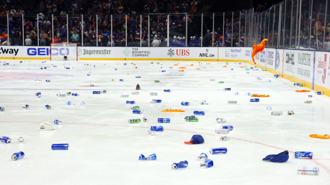 UNIONDALE, NEW YORK - JUNE 23: A view of the playing surface covered in debris after fans litter the ice following the New York Islanders 3-2 victory against the Tampa Bay Lightning during the first overtime period in Game Six of the Stanley Cup Semifinals during the 2021 Stanley Cup Playoffs at Nassau Coliseum on June 23, 2021 in Uniondale, New York.