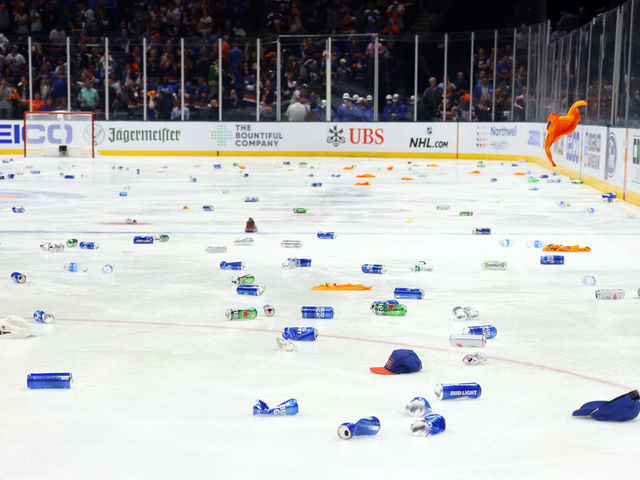 UNIONDALE, NEW YORK - JUNE 23: A view of the playing surface covered in debris after fans litter the ice following the New York Islanders 3-2 victory against the Tampa Bay Lightning during the first overtime period in Game Six of the Stanley Cup Semifinals during the 2021 Stanley Cup Playoffs at Nassau Coliseum on June 23, 2021 in Uniondale, New York.