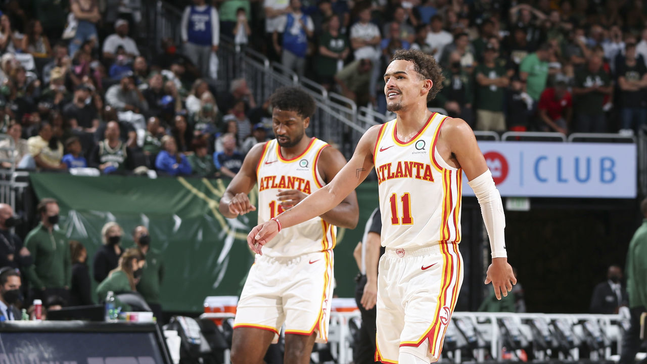 MILWAUKEE, WI - JUNE 23: Trae Young #11 of the Atlanta Hawks smiles during the game against the Milwaukee Bucks during Game 1 of the Eastern Conference Finals of the 2021 NBA Playoffs on June 23, 2021 at the Fiserv Forum Center in Milwaukee, Wisconsin. Mandatory Copyright Notice: Copyright 2021 NBAE .