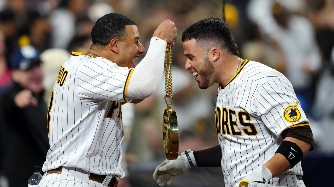 SAN DIEGO, CA - JUNE 23: Manny Machado #13 of the San Diego Padres celebrates with Victor Caratini #17 after Caratini hit a home run during the game between the Los Angeles Dodgers and the San Diego Padres at Petco Park on Wednesday, June 23, 2021 in San Diego, California.