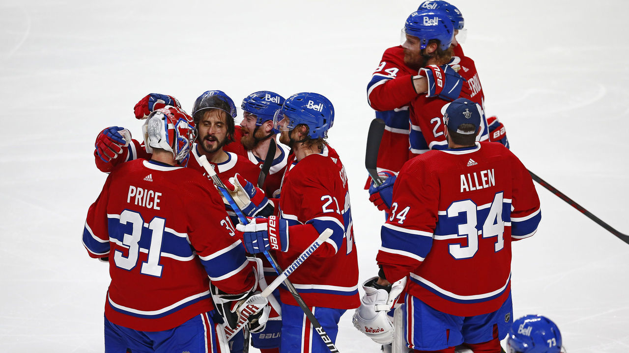 MONTREAL, QUEBEC - JUNE 24: The Montreal Canadiens celebrate the game-winning overtime goal scored by Artturi Lehkonen (not pictured) against the Vegas Golden Knights in Game Six of the Stanley Cup Semifinals of the 2021 Stanley Cup Playoffs at Bell Centre on June 24, 2021 in Montreal, Quebec.