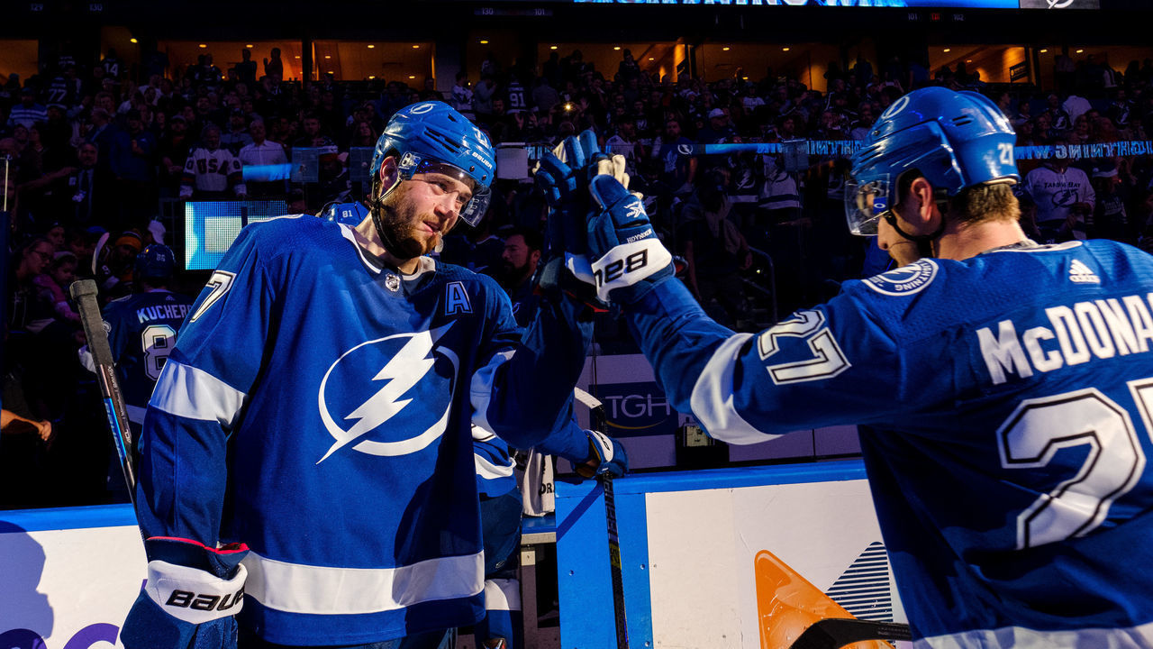 TAMPA, FL - DECEMBER 13: Victor Hedman #77 and Ryan McDonagh #27 of the Tampa Bay Lightning celebrate the win against the Toronto Maple Leafs at Amalie Arena on December 13, 2018 in Tampa, Florida.