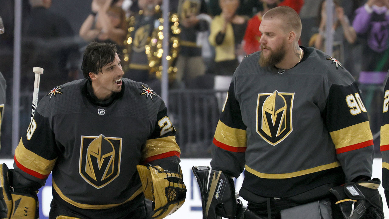 LAS VEGAS, NEVADA - MAY 28: Marc-Andre Fleury #29 and Robin Lehner #90 of the Vegas Golden Knights celebrate on the ice after the team's 6-2 victory over the Minnesota Wild in Game Seven of the First Round of the 2021 Stanley Cup Playoffs at T-Mobile Arena on May 28, 2021 in Las Vegas, Nevada.