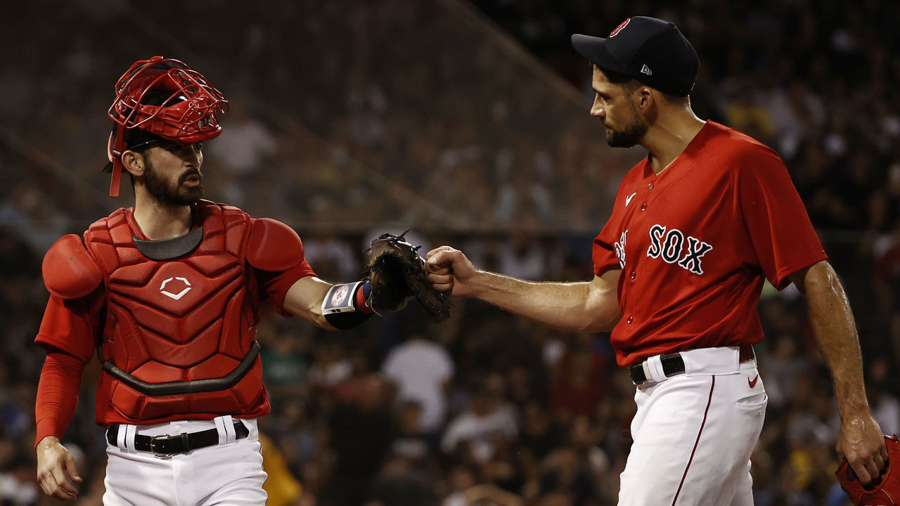 BOSTON, MA - JUNE 26: Connor Wong #74 of the Boston Red Sox congratulates Nathan Eovaldi #17 of the Boston Red Sox after retiring the side in the fifth inning against the New York Yankees at Fenway Park on June 26, 2021 in Boston, Massachusetts.