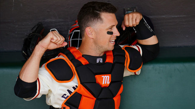 SAN FRANCISCO, CA - JUNE 19: Buster Posey #28 of the San Francisco Giants looks on from the dugout before during game between the Philadelphia Phillies and the San Francisco Giants at Oracle Park on Saturday, June 19, 2021 in San Francisco, California.