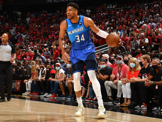 ATLANTA, GA - JUNE 27: Giannis Antetokounmpo #34 of the Milwaukee Bucks handles the ball against the Atlanta Hawks during Game 3 of the Eastern Conference Finals of the 2021 NBA Playoffs on June 27, 2021 at State Farm Arena in Atlanta, Georgia. NOTE TO USER: User expressly acknowledges and agrees that, by downloading and/or using this Photograph, user is consenting to the terms and conditions of the Getty Images License Agreement. Mandatory Copyright Notice: Copyright 2021 NBAE