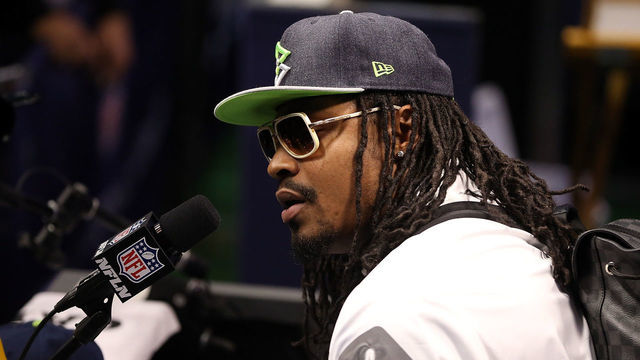 27 January 2015: Seattle Seahawks running back Marshawn Lynch #24 answers questions during the Super Bowl XLIX Media Day at US Airways Center in Phoenix, Az.