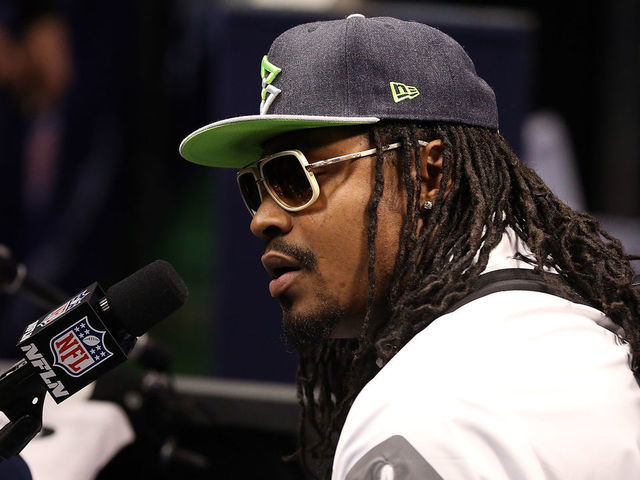 27 January 2015: Seattle Seahawks running back Marshawn Lynch #24 answers questions during the Super Bowl XLIX Media Day at US Airways Center in Phoenix, Az.