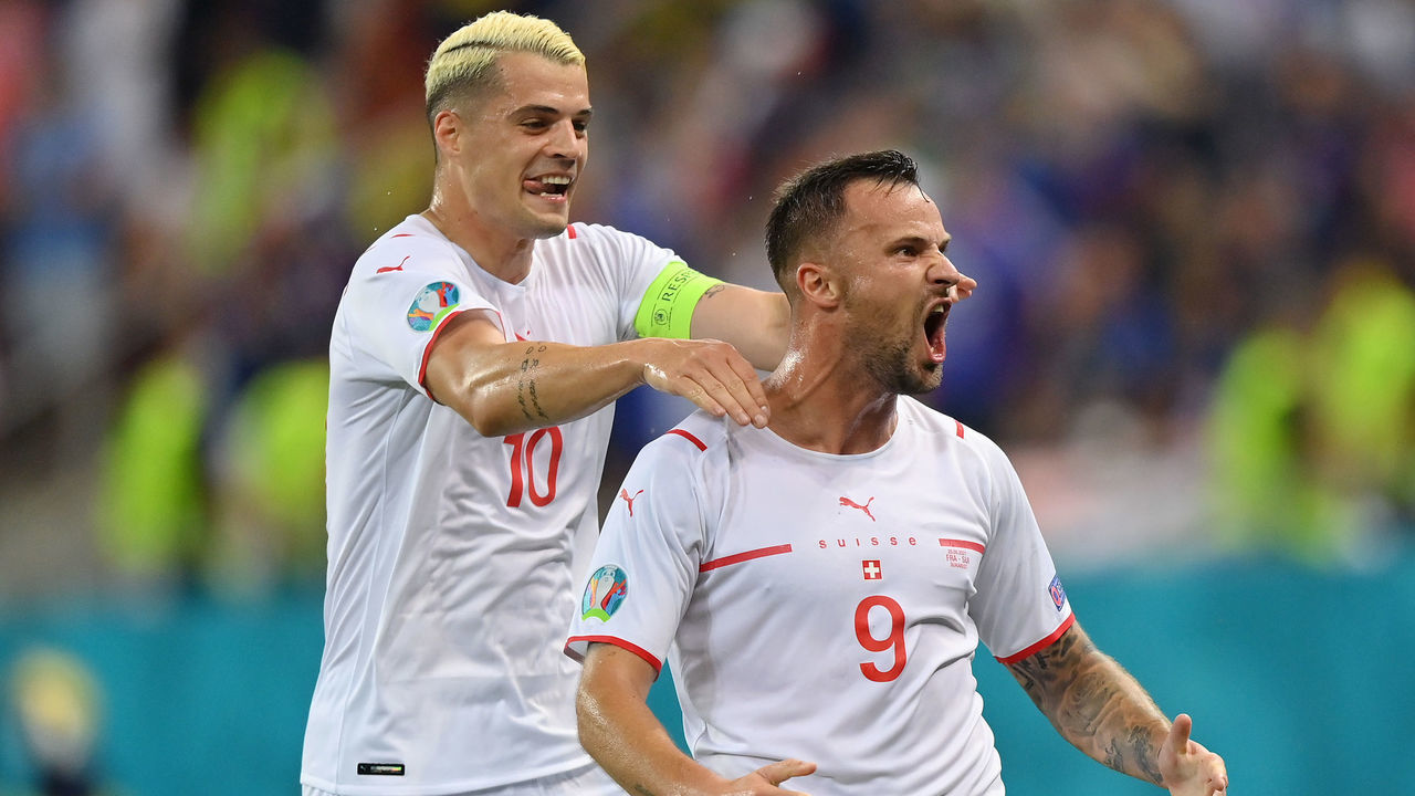 BUCHAREST, ROMANIA - JUNE 28: Haris Seferovic of Switzerland celebrates with Granit Xhaka after scoring their side's first goal during the UEFA Euro 2020 Championship Round of 16 match between France and Switzerland at National Arena on June 28, 2021 in Bucharest, Romania.