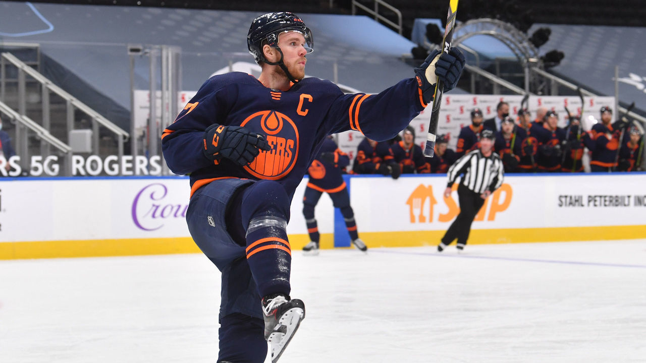 EDMONTON, AB - JANUARY 14: Connor McDavid #97 of the Edmonton Oilers celebrates after scoring a goal during the game against the Vancouver Canucks on January 14, 2021 at Rogers Place in Edmonton, Alberta, Canada.