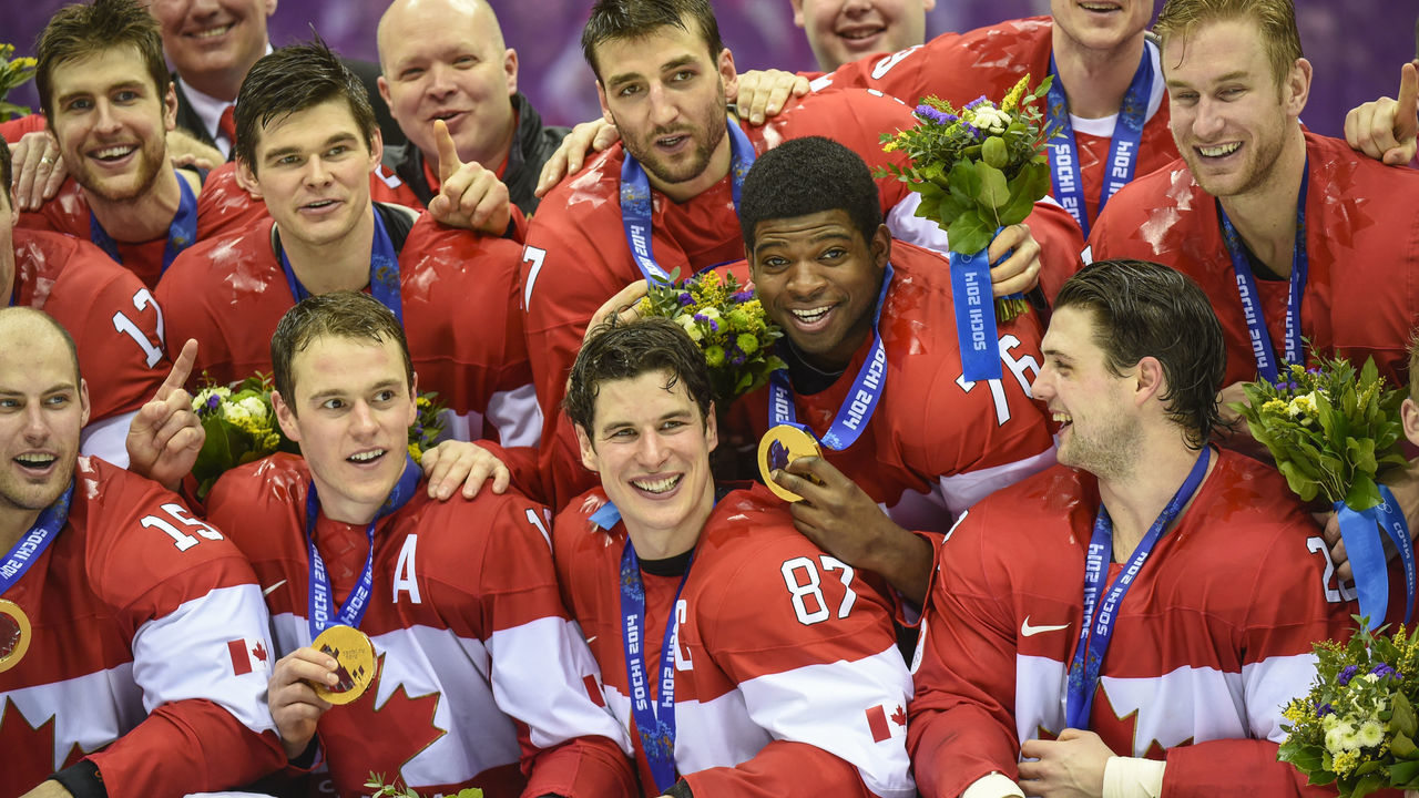 Sidney Crosby and Team Canada celebrate their gold medal after their 3-0 win over Sweden in the Sochi 2014 Winter Olympic Games: Men's hockey, Gold medal final.