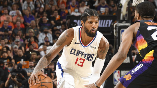PHOENIX, AZ - JUNE 28: Paul George #13 of the LA Clippers handles the ball during the game against the Phoenix Suns during Game 5 of the Western Conference Finals of the 2021 NBA Playoffs on June 28, 2021 at Phoenix Suns Arena in Phoenix, Arizona. Mandatory Copyright Notice: Copyright 2021 NBAE