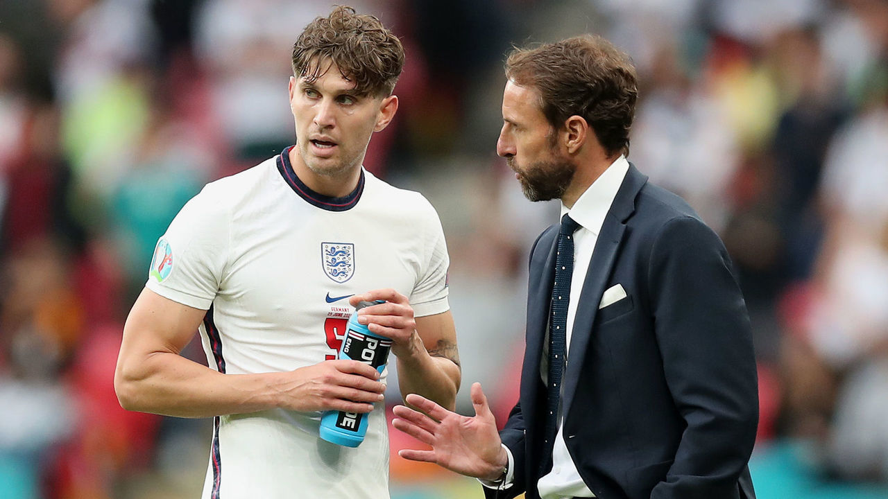 LONDON, ENGLAND - JUNE 29: Gareth Southgate, Head Coach of England speaks with John Stones of England during the UEFA Euro 2020 Championship Round of 16 match between England and Germany at Wembley Stadium on June 29, 2021 in London, England.