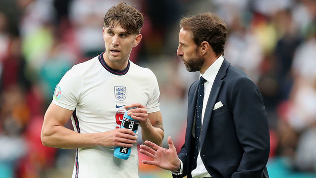 LONDON, ENGLAND - JUNE 29: Gareth Southgate, Head Coach of England speaks with John Stones of England during the UEFA Euro 2020 Championship Round of 16 match between England and Germany at Wembley Stadium on June 29, 2021 in London, England.