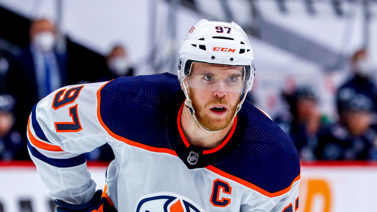 WINNIPEG, MB - MAY 24: Connor McDavid #97 of the Edmonton Oilers prepares for a second period face-off against the Winnipeg Jets in Game Four of the First Round of the 2021 Stanley Cup Playoffs at Bell MTS Place on May 24, 2021 in Winnipeg, Manitoba.
