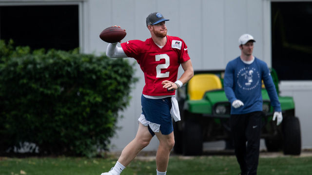 INDIANAPOLIS, IN - MAY 27: Indianapolis Colts quarterback Carson Wentz (2) runs through a drill during the Indianapolis Colts offseason practice on May 27, 2021 at the Indiana Farm Bureau Football Center in Indianapolis, IN.