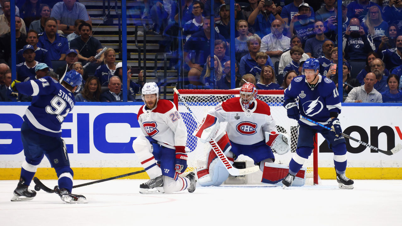 TAMPA, FLORIDA - JUNE 28: Jon Merrill #28 and Carey Price #31 of the Montreal Canadiens defend against Steven Stamkos #91 of the Tampa Bay Lightning during Game One of the 2021 NHL Stanley Cup Finals against the Tampa Bay Lightning at Amalie Arena on June 28, 2021 in Tampa, Florida.