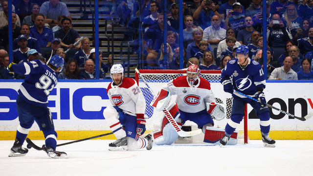TAMPA, FLORIDA - JUNE 28: Jon Merrill #28 and Carey Price #31 of the Montreal Canadiens defend against Steven Stamkos #91 of the Tampa Bay Lightning during Game One of the 2021 NHL Stanley Cup Finals against the Tampa Bay Lightning at Amalie Arena on June 28, 2021 in Tampa, Florida.