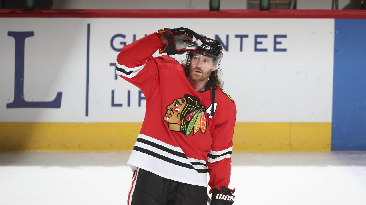 CHICAGO, ILLINOIS - MARCH 25: Duncan Keith #2 of the Chicago Blackhawks looks up during warm-ups prior to a game against the Florida Panthers at the United Center on March 25, 2021 in Chicago, Illinois.