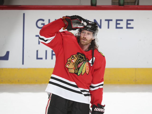 CHICAGO, ILLINOIS - MARCH 25: Duncan Keith #2 of the Chicago Blackhawks looks up during warm-ups prior to a game against the Florida Panthers at the United Center on March 25, 2021 in Chicago, Illinois.