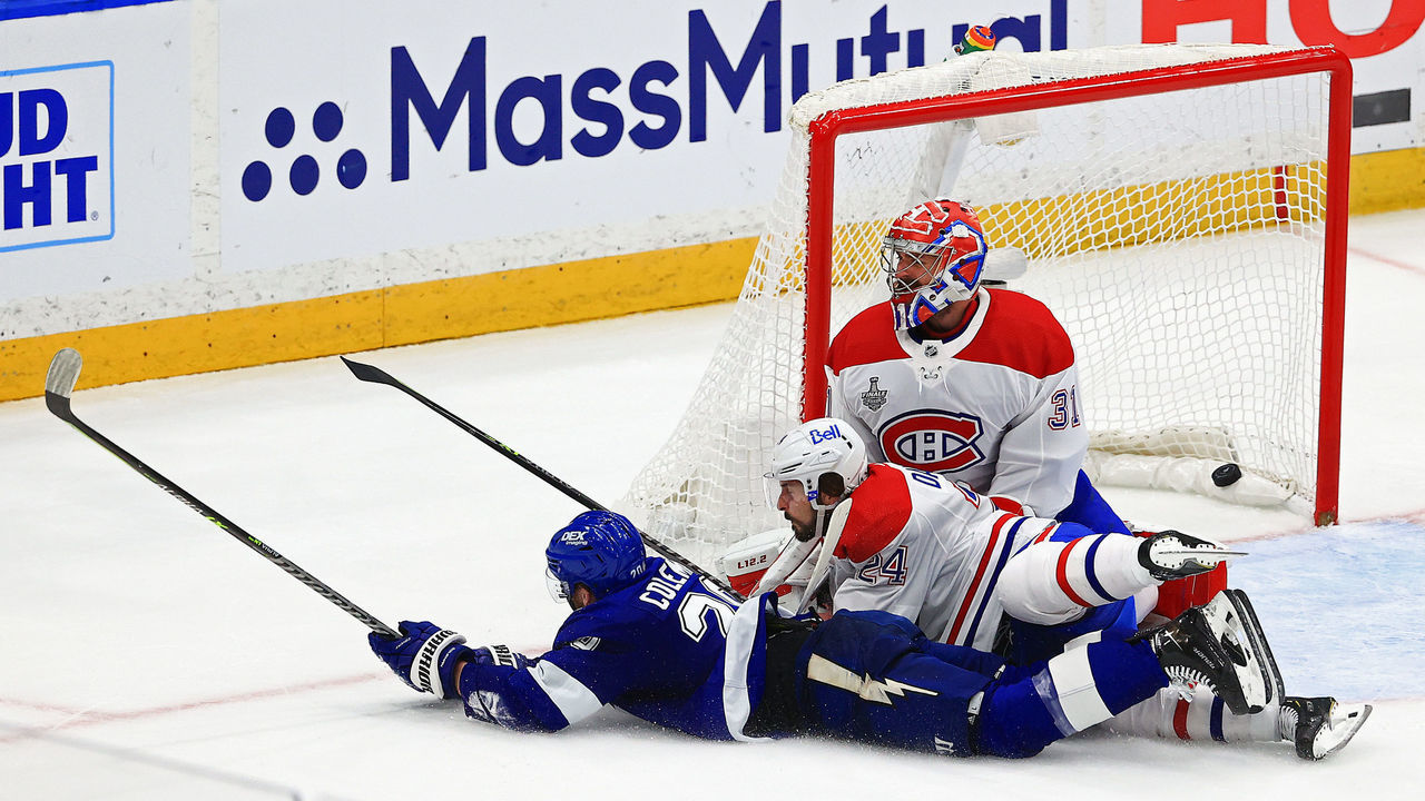 TAMPA, FLORIDA - JUNE 30: Blake Coleman #20 of the Tampa Bay Lightning scores a goal past Carey Price #31 of the Montreal Canadiens as Phillip Danault #24 defends during the second period in Game Two of the 2021 NHL Stanley Cup Final at Amalie Arena on June 30, 2021 in Tampa, Florida.
