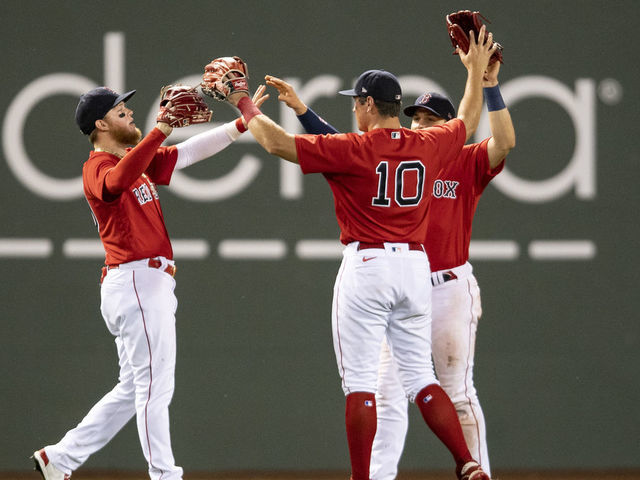 Boston Red Sox's Bobby Dalbec celebrates with Enrique Hernandez