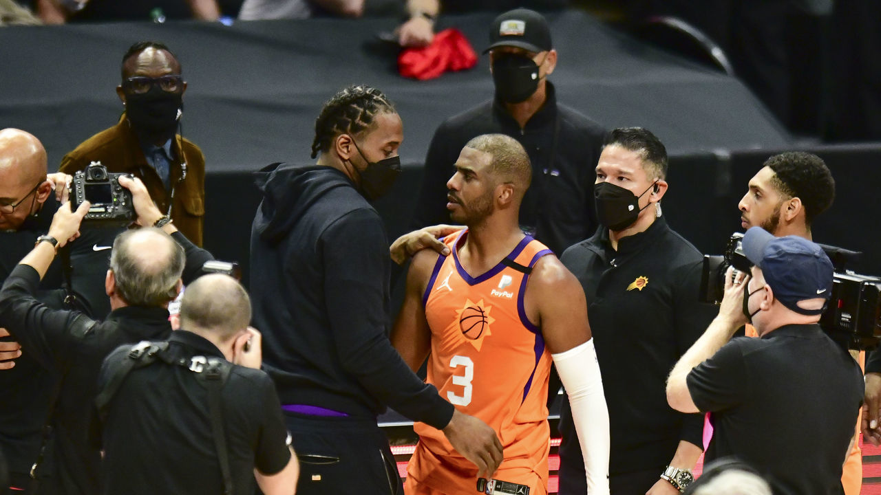 LOS ANGELES, CA - JUNE 30: Kawhi Leonard #2 of the LA Clippers talks to Chris Paul #3 of the Phoenix Suns after the game during Game 6 of the Western Conference Finals of the 2021 NBA Playoffs on June 30, 2021 at STAPLES Center in Los Angeles, CA. Mandatory Copyright Notice: Copyright 2021 NBAE