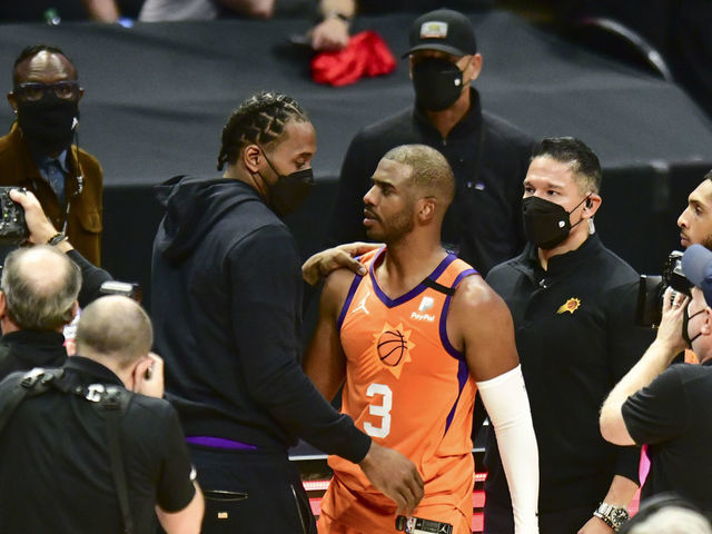 LOS ANGELES, CA - JUNE 30: Kawhi Leonard #2 of the LA Clippers talks to Chris Paul #3 of the Phoenix Suns after the game during Game 6 of the Western Conference Finals of the 2021 NBA Playoffs on June 30, 2021 at STAPLES Center in Los Angeles, CA. Mandatory Copyright Notice: Copyright 2021 NBAE
