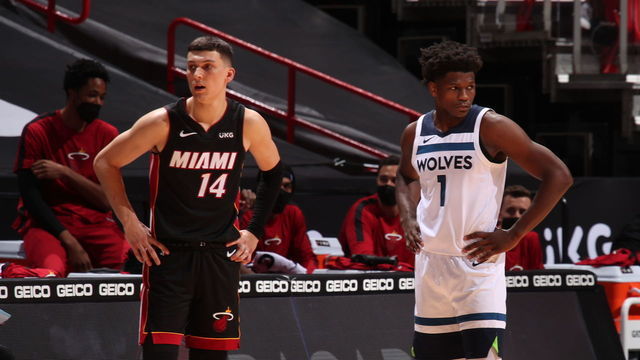 MIAMI, FL - MAY 7: Tyler Herro #14 of the Miami Heat and Anthony Edwards #1 of the Minnesota Timberwolves looks on during the game on May 7, 2021 at American Airlines Arena in Miami, Florida. Mandatory Copyright Notice: Copyright 2021 NBAE