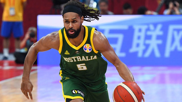 BEIJING, CHINA - SEPTEMBER 15: Patty Mills #5 of Australia handles the ball against France during the 2019 FIBA World Cup Third Place Game at the Cadillac Arena on September 15, 2019 in Beijing, China. NOTE TO USER: User expressly acknowledges and agrees that, by downloading and/or using this Photograph, user is consenting to the terms and conditions of the Getty Images License Agreement. Mandatory Copyright Notice: Copyright 2019 NBAE