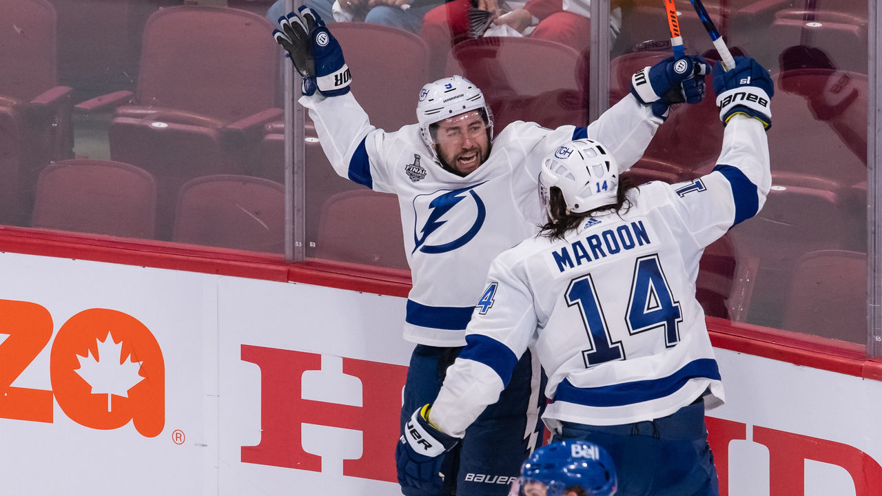 MONTREAL, QC - JULY 02: Tyler Johnson (9) of the Tampa Bay Lightning celebrates with teammates during the third period of Game 3 of the 2021 NHL Stanley Cup Final between the Tampa Bay Lightning and the Montreal Canadiens at Bell Centre on July 02, 2021 in Montreal, Quebec, Canada