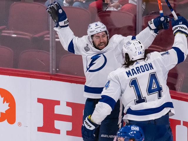 MONTREAL, QC - JULY 02: Tyler Johnson (9) of the Tampa Bay Lightning celebrates with teammates during the third period of Game 3 of the 2021 NHL Stanley Cup Final between the Tampa Bay Lightning and the Montreal Canadiens at Bell Centre on July 02, 2021 in Montreal, Quebec, Canada