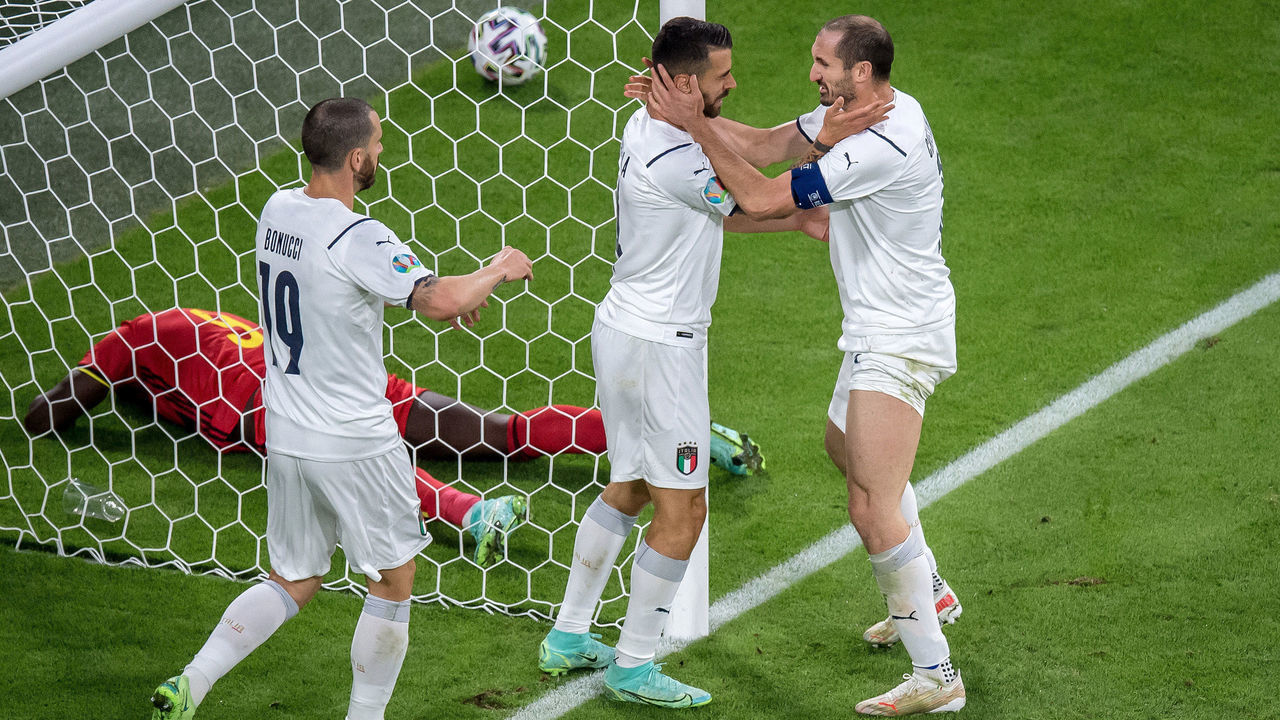 MUNICH, GERMANY - JULY 02: Leonardo Spinazzola (C) of Italy celebrates with Giorgio Chiellini (R) and Leonardo Bonucci during the UEFA Euro 2020 Championship Quarter-final match between Belgium and Italy at Football Arena Munich on July 02, 2021 in Munich, Germany.