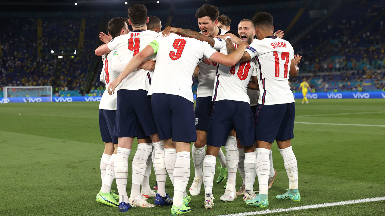 ROME, ITALY - JULY 03: Harry Kane of England celebrates with Harry Maguire, Luke Shaw and team mates after scoring their side's third goal during the UEFA Euro 2020 Championship Quarter-final match between Ukraine and England at Olimpico Stadium on July 03, 2021 in Rome, Italy.