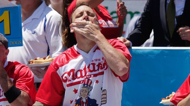 NEW YORK, NY - JULY 04: Joey Chestnut participates in the men's hot dog eating contest on July 4, 2019 in New York City. Nathan's held its first hot dog eating contest in Coney Island on July 4, 1916.