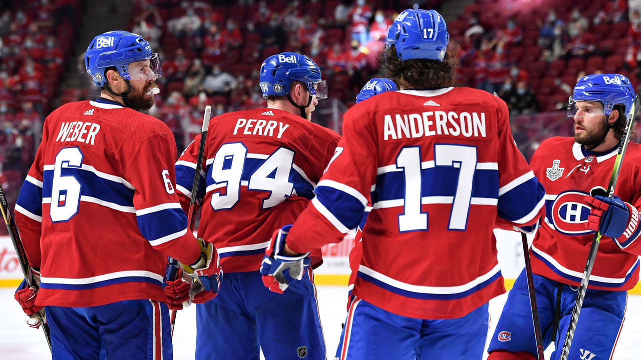 MONTREAL, QC - JULY 2: Corey Perry #94 of the Montreal Canadiens celebrates with teammates after scoring a goal against the Tampa Bay Lightning in Game Three of the Stanley Cup Final of the 2021 Stanley Cup Playoffs at the Bell Centre on July 2, 2021 in Montreal, Quebec, Canada.