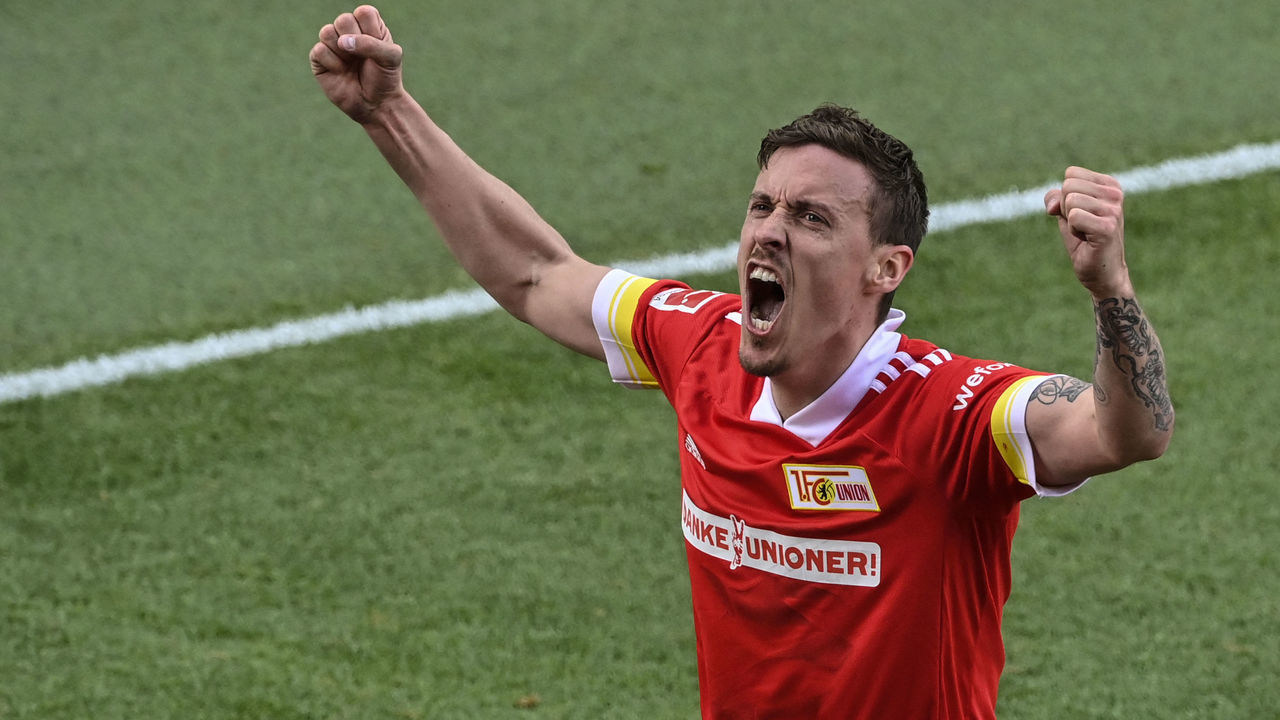 Union Berlin's German forward Max Kruse celebrates scoring during the German first division Bundesliga football match 1 FC Union Berlin vs RB Leipzig in Berlin, on May 22, 2021. - DFL REGULATIONS PROHIBIT ANY USE OF PHOTOGRAPHS AS IMAGE SEQUENCES AND/OR QUASI-VIDEO