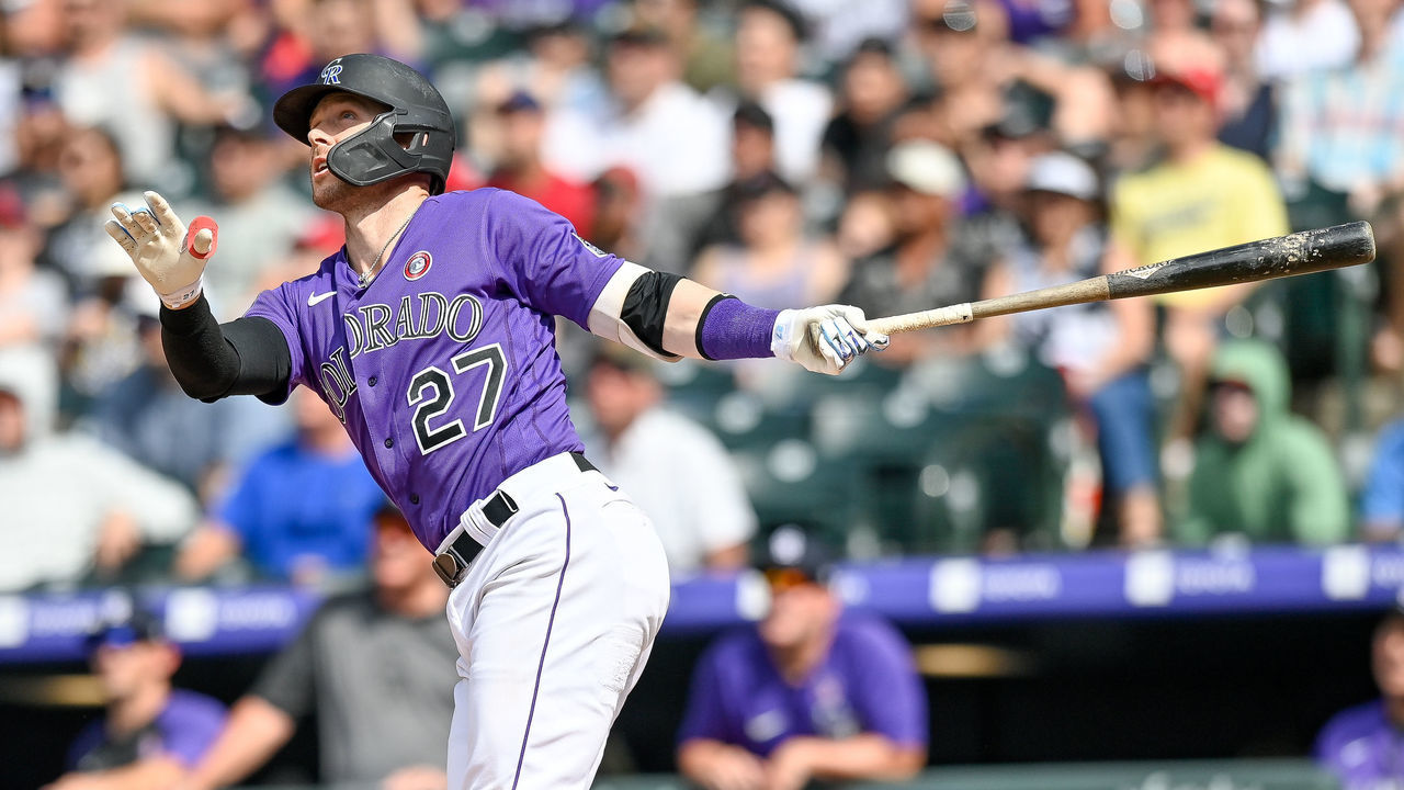 DENVER, CO - JULY 04: Trevor Story #27 of the Colorado Rockies follows the flight of an eighth inning RBI sacrifice fly ball against the St. Louis Cardinals that would at Coors Field on July 4, 2021 in Denver, Colorado.
