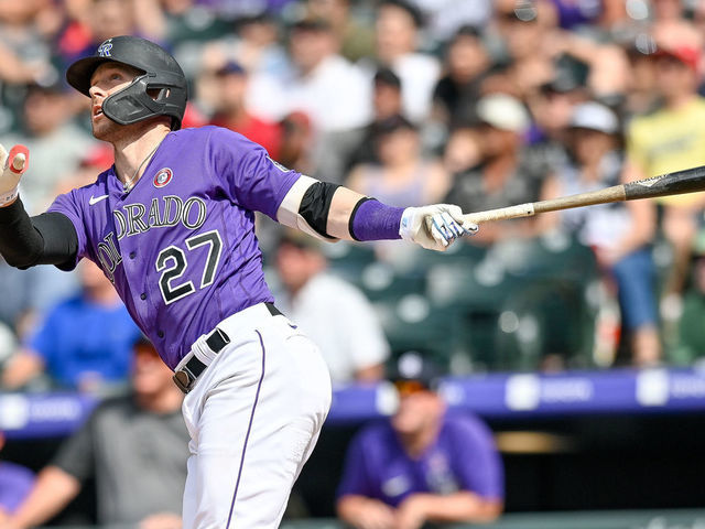 DENVER, CO - JULY 04: Trevor Story #27 of the Colorado Rockies follows the flight of an eighth inning RBI sacrifice fly ball against the St. Louis Cardinals that would at Coors Field on July 4, 2021 in Denver, Colorado.