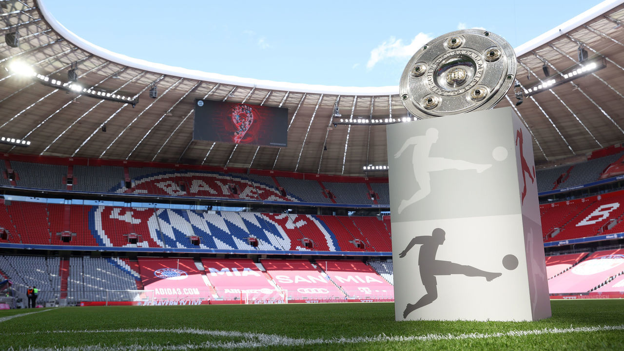 MUNICH, GERMANY - MAY 22: A general view inside the stadium as the Bundesliga Meisterschale Trophy is seen on a plinth ahead of the Bundesliga match between FC Bayern München and FC Augsburg at Allianz Arena on May 22, 2021 in Munich, Germany. After the Bavarian cabinet decided on first relaxations for outdoor events, the current Corona situation allows FC Bayern to have its last match of the season in front of 250 spectators in the Allianz Arena. Of these, 100 tickets are given to people from the health sector selected by the Ministry of Health.