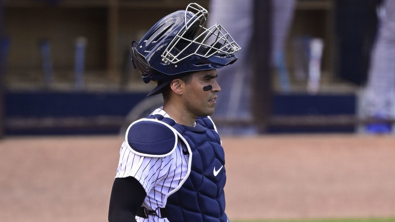 TAMPA, FLORIDA - FEBRUARY 28: Robinson Chirinos #61 of the New York Yankees walks on the field during the first inning against the Toronto Blue Jays during a spring training game at George M. Steinbrenner Field on February 28, 2021 in Tampa, Florida.