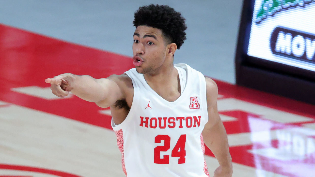 HOUSTON, TEXAS - FEBRUARY 21: Quentin Grimes #24 of the Houston Cougars reacts after a basket during the first half of a game against the Cincinnati Bearcats at the Fertitta Center on February 21, 2021 in Houston, Texas.